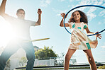 Grandfather, girl child and family hula hoop in city, having fun and bonding together outdoors. Love, portrait and low angle of grandpa and kid playing with hoops toy, dance and enjoying quality time