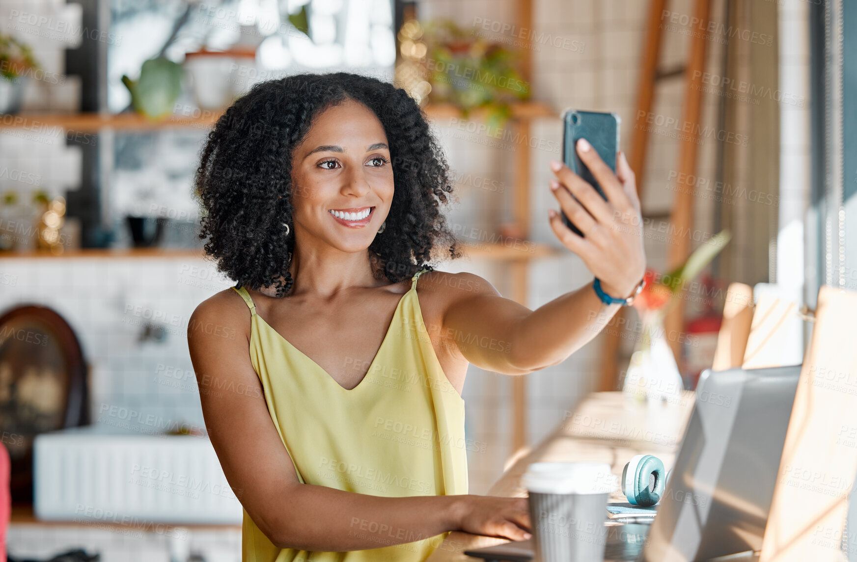 Buy stock photo Black woman, coffee shop and selfie with smile, happiness and relax for social media, app or profile picture. Young gen z girl, student and cafe with smartphone, photo and laptop for research study