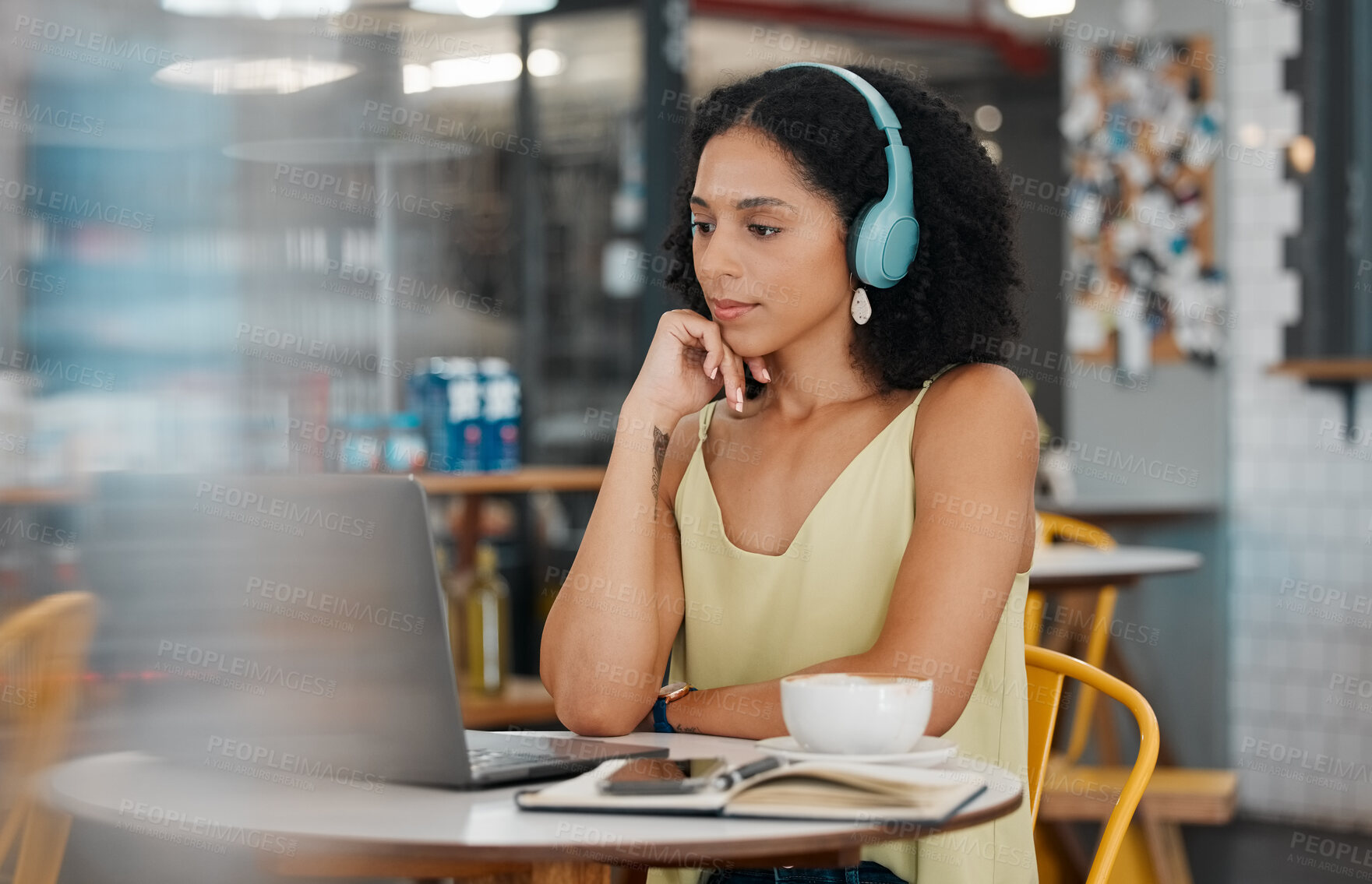 Buy stock photo Video call, laptop and black woman in coffee shop for meeting, virtual conference and networking. Communication, cafe and girl with headphones on computer for webinar, freelance and remote work