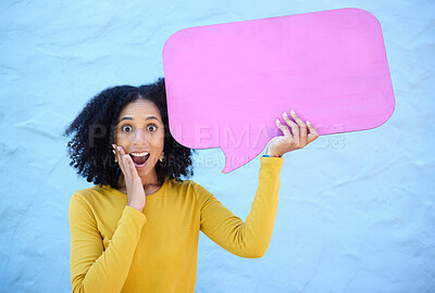 Buy stock photo Wow, portrait and black woman with speech bubble in studio for advertising, mockup on blue background. Face, omg and girl with billboard or poster on news, social media, or discount for shock sale