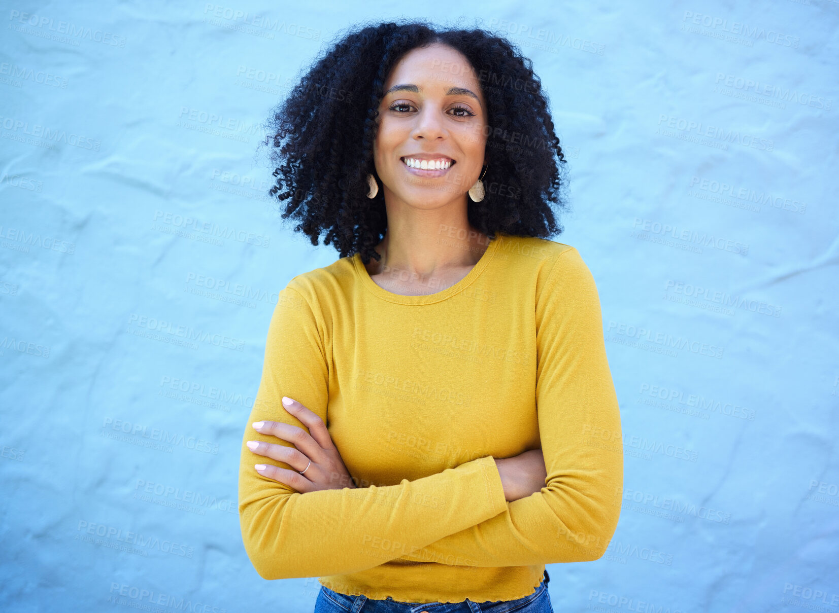 Buy stock photo Proud, portrait and black woman in studio on mockup, space and blue background for advertising. Face, smile and girl relax on backdrop, cheerful and confident, relax and posing inside on copy space