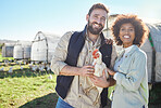 Farmer couple, chicken and agriculture with animal on farm, portrait and poultry farming with organic free range product. Livestock, agro business and sustainability with people in protein industry