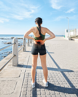 Buy stock photo Sports woman, back pain and red glow by beach fitness, ocean workout or sea training with healthcare wellness crisis. Injury, ache and body stress for runner with abstract burnout on medical anatomy