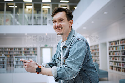 Buy stock photo Portrait, university or man with phone in library for research, communication or blog news. Books, education or student smile on smartphone for scholarship networking, social media or online content