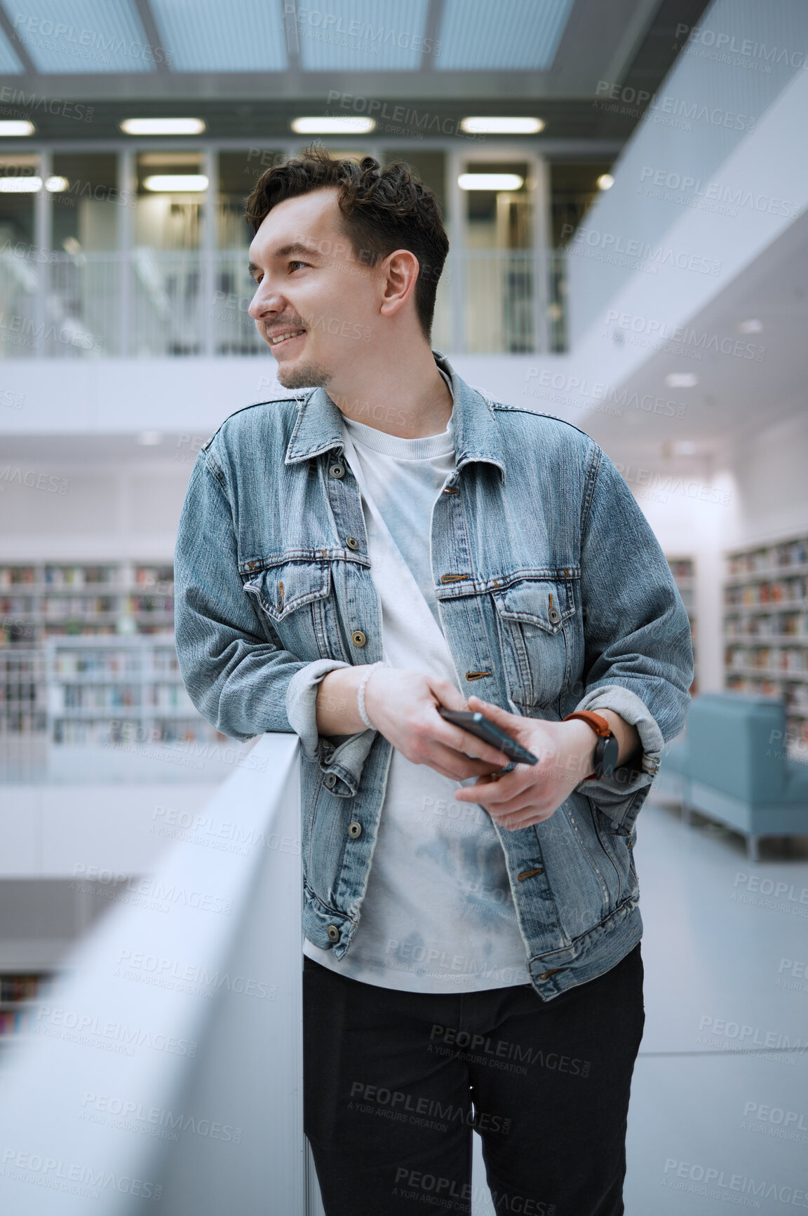 Buy stock photo Education, college and man student in the library for studying, learning or researching for a test. University, scholarship and male standing in a book store to work on a school task, exam or project
