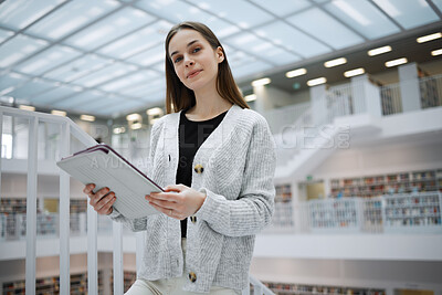 Buy stock photo University, student portrait or woman with tablet in library for research, education or learning. Bookshelf, smile or girl on tech for scholarship, search or planning school project at collage campus