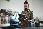 Tablet, barista man and cafe employee working on digital retail shop design for business. Coffee shop waiter, ecommerce and person planning a restaurant web page for online shopping and networking