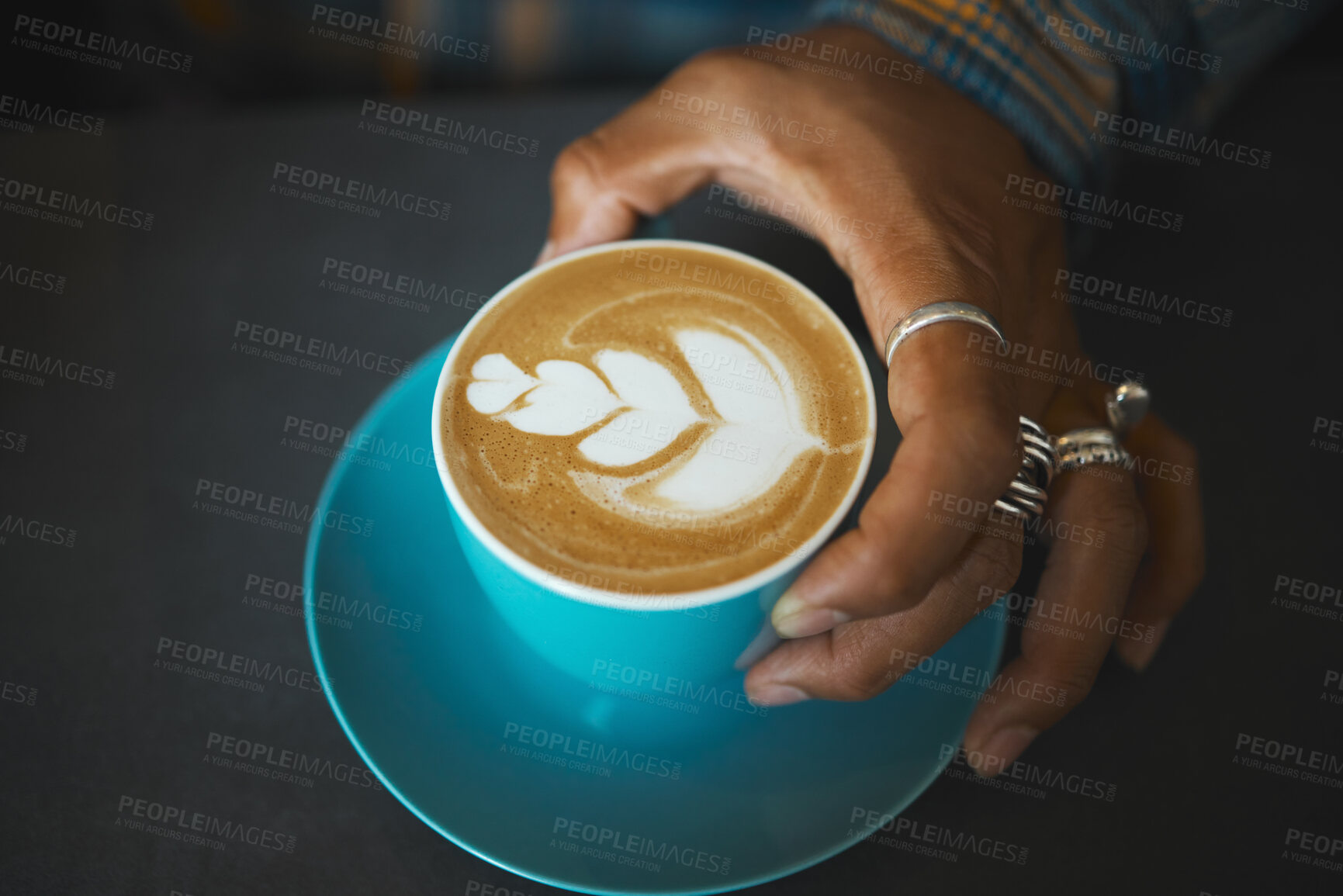 Buy stock photo Latte art, coffee and barista hand with leaf design, caffeine and artistic product with pattern in cafe. Creative, man and drawing with milk foam, hospitality with service and beverage closeup