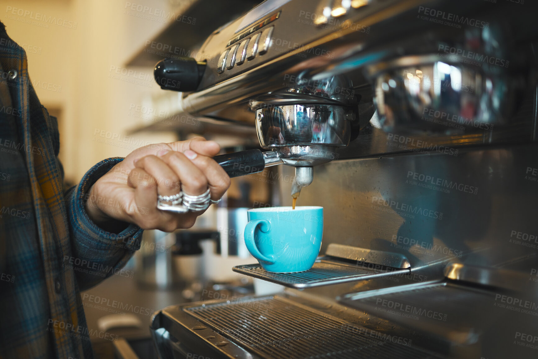 Buy stock photo Coffee shop machine handle, hand of barista brewing espresso in restaurant and closeup of hot water beverage in cafe. Caffeine drink in mug, person holding tool on morning in kitchen and breakfast