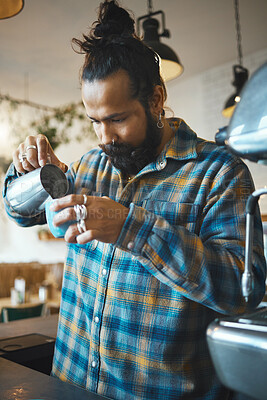 Buy stock photo Barista man, coffee shop and milk for drink service at small business with focus, care or experience. Young entrepreneur, cafe and expert with latte, cappuccino or tea for energy, health and wellness