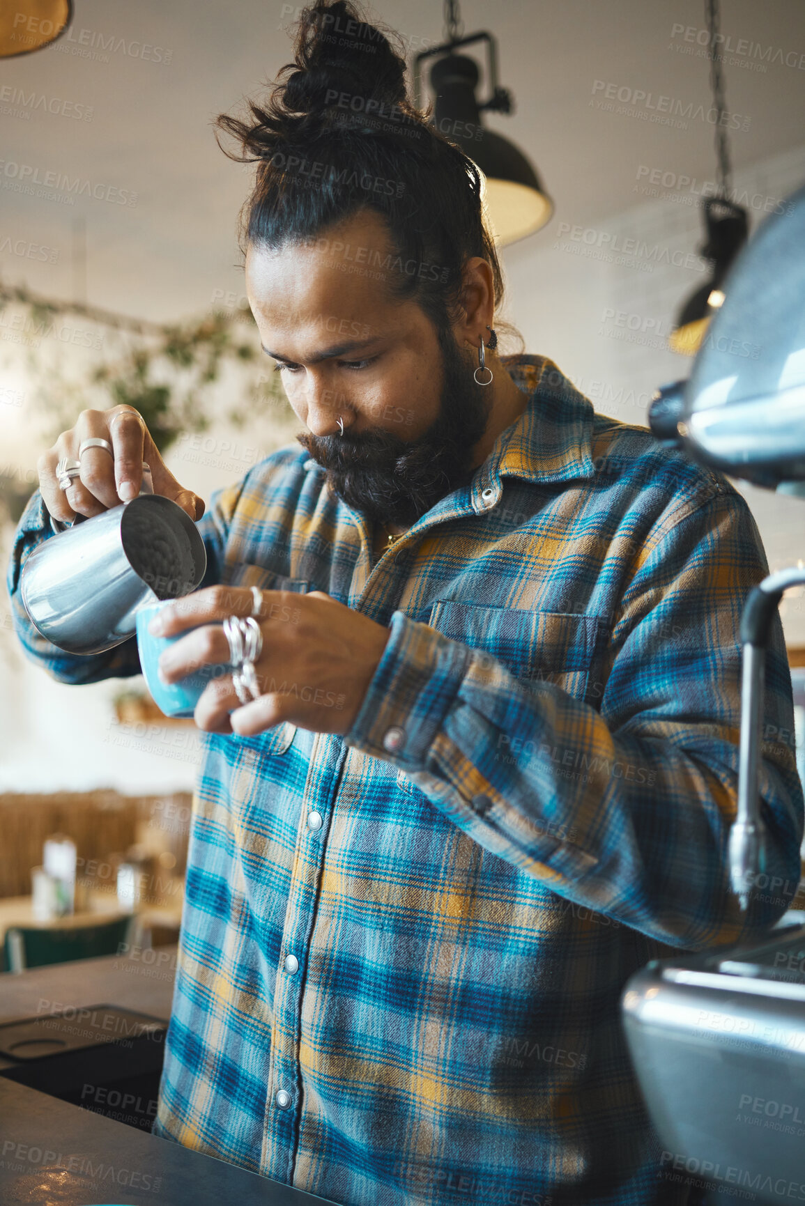 Buy stock photo Barista man, coffee shop and milk for drink service at small business with focus, care or experience. Young entrepreneur, cafe and expert with latte, cappuccino or tea for energy, health and wellness