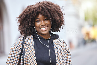 Buy stock photo Black woman, portrait and smile with earphones in city, urban town and Kenya. Happy plus size african female listening to music, radio and audio podcast with natural afro, happiness and relax outdoor