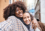 Friendship, happy and portrait of women on a holiday together walking in the city street in Italy. Happiness, smile and interracial female gay couple hugging in the road in town while on a vacation.