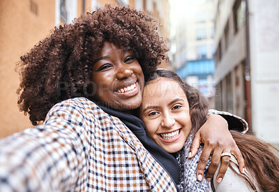 Buy stock photo Friendship, happy and portrait of women on a holiday together walking in the city street in Italy. Happiness, smile and interracial female gay couple hugging in the road in town while on a vacation.