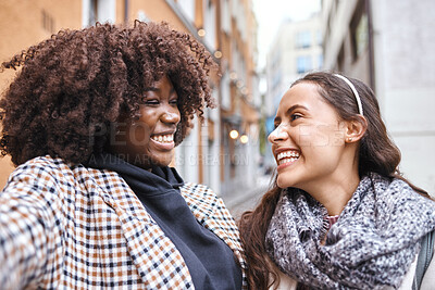 Buy stock photo Selfie, travel and laughing in the city with a woman friends outdoor for tourism or adventure overseas. Photograph, tourist or laughter with a happy female and friend joking in an urban town