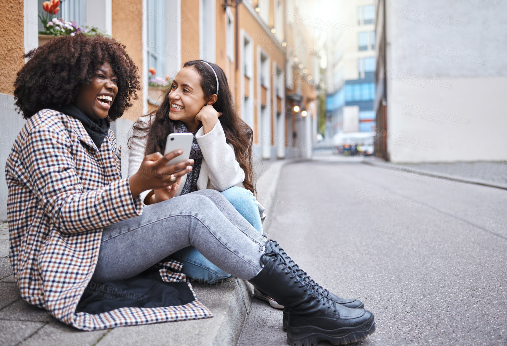 Buy stock photo Friends, city and women with phone for social media, conversation and connection on London street. Communication, internet and happy black woman and girl on smartphone laugh for meme, website and app