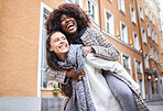 Girl friends, laugh and city adventure of young people with a piggyback and travel happiness. Freedom, diversity and women smile outdoor feeling happy on a vacation walk on a urban holiday together