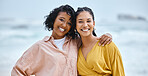 Beach, hug and portrait of couple of friends for lgbtq, lesbian or love and freedom on vacation together with ocean water. Black woman and partner on date, fun and excited for sea, valentines holiday