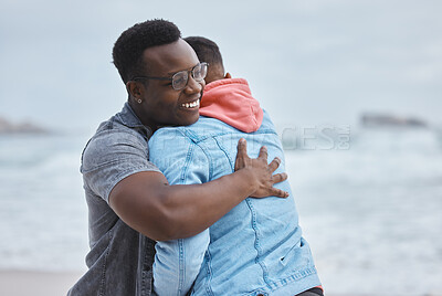 Buy stock photo Friendship, love and men hugging on the beach for a reunion while on a summer vacation or holiday. Happy, smile and loving gay couple embracing by the ocean while on a seaside weekend trip in Hawaii.