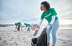 Teamwork, trash and recycling with woman on beach for sustainability, environment and eco friendly. Climate change, earth day and nature with volunteer and plastic for help, energy and pollution