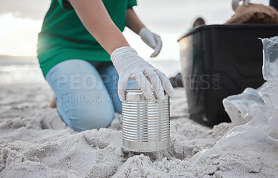 Buy stock photo Recycle, volunteer hand cleaning beach and can in sand, picking up dirt at ocean on earth day. Community service, sustainability and environmental charity, people pick up trash for future of planet.