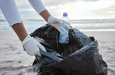 Buy stock photo Cleaning, plastic and hands of woman at beach for recycle, environment or earth day. Recycling, sustainability and climate change with charity volunteer and trash for pollution and eco friendly