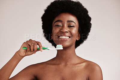 Buy stock photo Black woman, brushing teeth and toothbrush portrait for clean and healthy mouth on studio background. Face of happy person advertising dentist tips for dental care, hygiene and cleaning with a smile