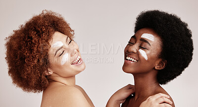 Buy stock photo Cream, face treatment and girl friends with black women and happiness for skincare and beauty in studio. Wellness, people and spa aesthetic with lotion and moisturizer for facial and cosmetic product