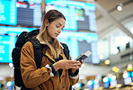 Travel, passport and woman with phone at airport lobby for
social media, internet browsing or web scrolling. Vacation, mobile technology and female with smartphone and ticket for global traveling.