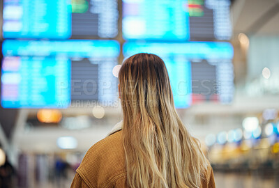 Buy stock photo Woman, airport and reading board, screen and flight schedule for travel, plane and adventure with back. Girl, immigration and global transportation in lobby for airplane time, departure or arrival