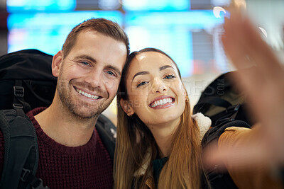 Buy stock photo Couple, love and travel selfie at airport lobby taking pictures for holiday, vacation or global traveling. Portrait, flight and man and woman take photo for social media, profile or happy memory.