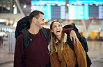 Travel, hug and couple at airport talking, chatting or laughing at comic or funny joke. Valentines love, thinking and happy man and woman in airline lobby waiting for flight departure for vacation.