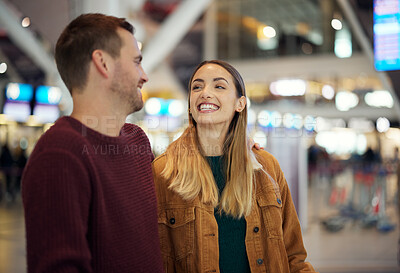 Buy stock photo Love, travel and couple at airport talking, chatting or laughing at funny joke. Valentines day, comic and happy man and woman in airline lobby waiting for flight departure for vacation or holiday.