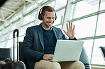 Computer call, wave and business man at an airport in a online meeting ready for work travel. Consulting, businessman and web worker traveling for a job interview talking on a digital conference