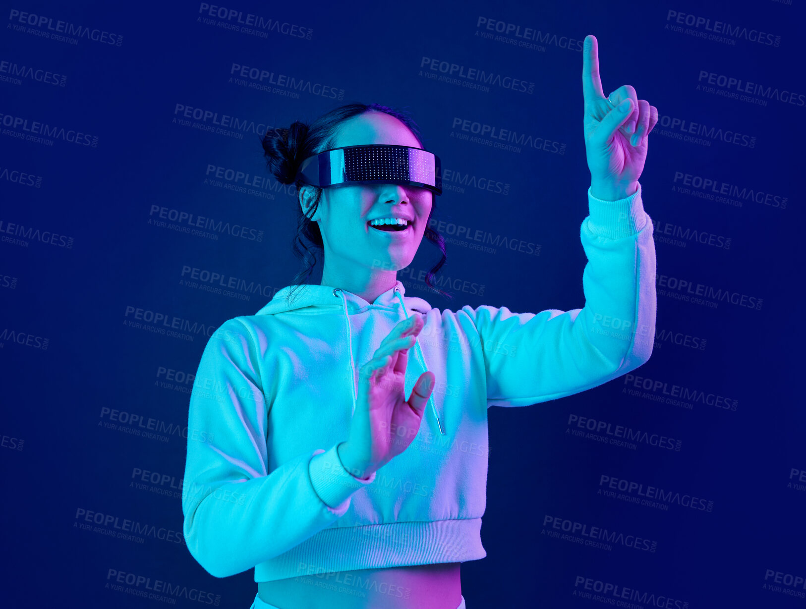 Buy stock photo Woman, metaverse and virtual reality glasses for futuristic gaming, cyber and 3d world. Gamer person excited with hand for wow ar, digital experience and vr ux cyberpunk blue background tech app