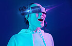 Metaverse, headset and shocked woman in a virtual reality in studio for futuristic innovation technology. Digital simulation, gaming and female with vr goggles for cyber tech by dark blue background.