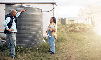 Buy stock photo Water, tank and sustainable or sustainability advice by farmer to a mother for the environment on a farm. Saving, agriculture and eco friendly people talking about organic farming in the countryside