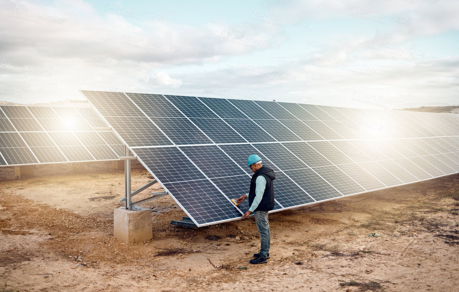 Buy stock photo Engineering man, desert and solar panels inspection for future, renewable energy and sustainability of planet. Photovoltaic innovation, clean electricity technology and sustainable goals for earth