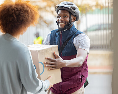 Buy stock photo Black man, smile and delivery with box for woman at house for logistics, cargo and safety. Young african courier, package and shipping service with stock, helmet and e commerce job in neighborhood