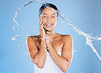 Happy black woman, water splash or showering in skincare grooming, healthcare or sustainability cleaning on isolated blue background. Zoom, smile or beauty model in wet drops or hydration dermatology
