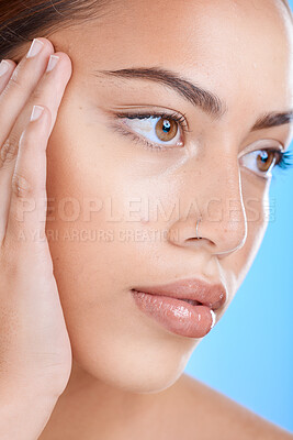 Buy stock photo Skincare, face and woman in studio for beauty, wellness and cosmetics grooming on blue background. Skin, facial and girl model relax in luxury, collagen and dermatology, self care or hygiene isolated