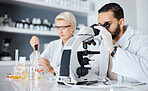 Science, collaboration and innovation with a medicine team working in a laboratory for research or development. Doctor, teamwork or medical with a man and woman scientist at work in a pathology lab