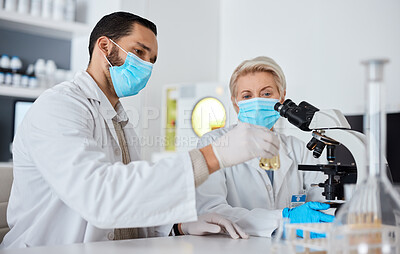 Buy stock photo Research, glass beaker and scientists working in laboratory for medical cure or vaccine. Innovation, teamwork and team of professional scientific experts with face mask in pharmaceutical science lab.