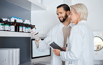 Buy stock photo Science, medicine and people in laboratory with tablet for vaccine results, medical report and research. Pharmaceutical, health and scientists team reading label for data analysis, lab test and study