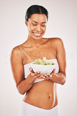 Buy stock photo Health, smile or woman with grapes in a studio for a healthy snack, nutrition diet or heart benefits. Body goals, lose weight or happy young female model eating fruits isolated by a white background