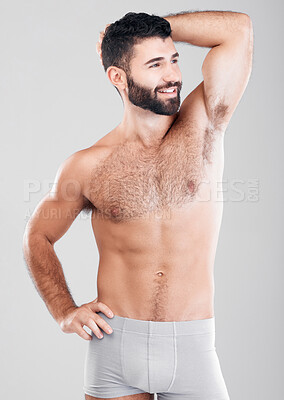 Buy stock photo Fitness, body and strong man in underwear for exercise, weight loss and wellness on a studio background. Aesthetic person for health, motivation and stomach or sexy muscle growth on healthy diet