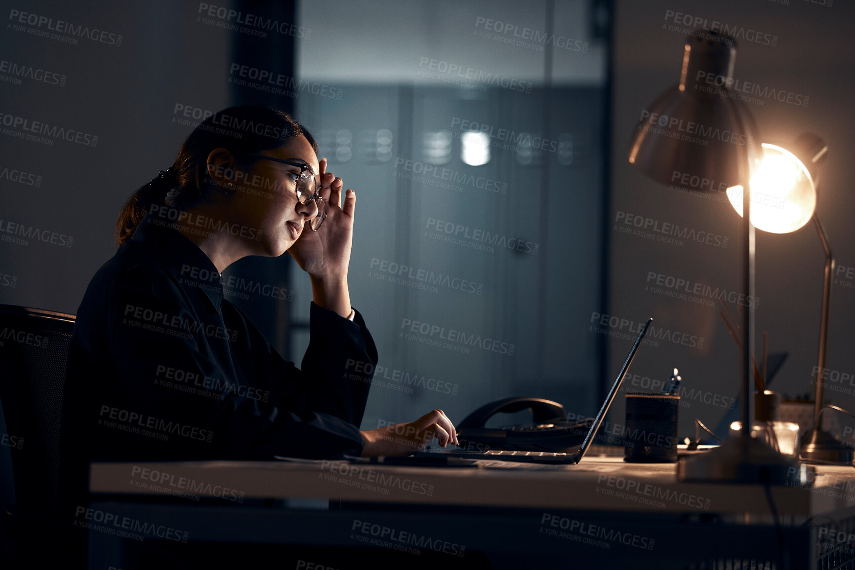 Buy stock photo Stress, laptop and business woman at night working on project, planning report and strategy deadline. Burnout, dark office and tired female worker at desk with headache, fatigue and thinking of ideas
