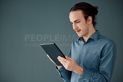 Buy stock photo Digital tablet, mockup and man in studio on internet, search or communication advertising on black background. App, website and businessman online schedule, planning and project, isolated and space
