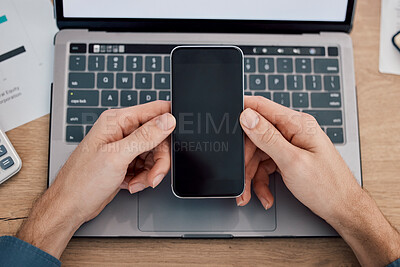Buy stock photo Hands, phone and green screen by laptop on mockup for advertising, marketing or networking at office desk. Hand of person with mobile smartphone on mock up display by computer in advertisement or app