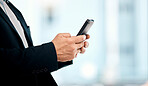Businessman, phone and hands typing in networking, communication or social media for corporate idea on mockup. Hand of male manager or CEO texting on smartphone for chatting, browsing or conversation